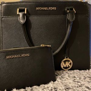 Black Michael Kors purse and matching wallet